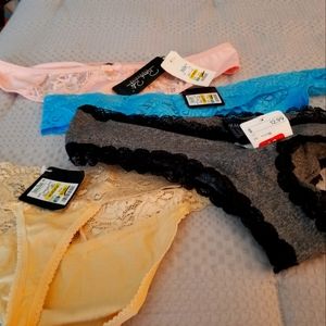 SOLD Four pair of brand new Stein Mart thongs size XL. Purchased for my sister.